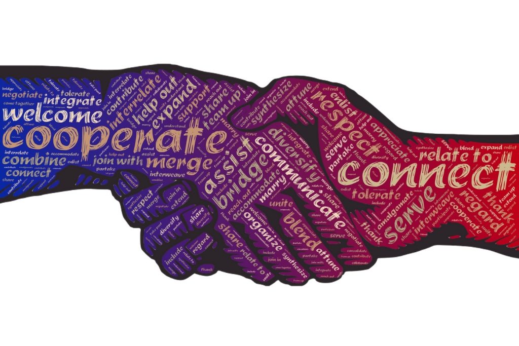 Shaking hands with works like connect and cooperate all over it